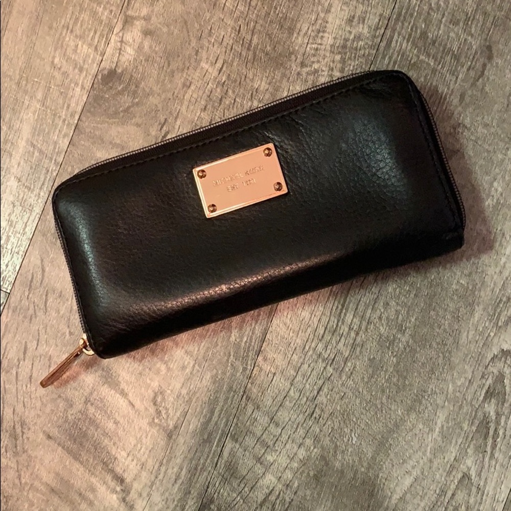 Rose gold Michael Kors wallet.